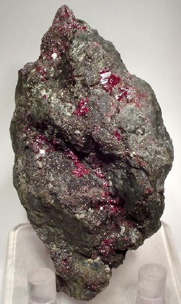 Cinnabar, mercury sulfide: bright red crystals in rock, with a scarlet streak. Roasting it releases mercury vapour, which is poisonous.