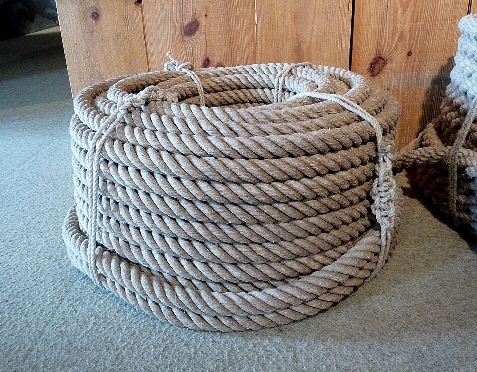 Hemp rope, laid up from fibre. Almost nothing else on the ladder gets built without it.