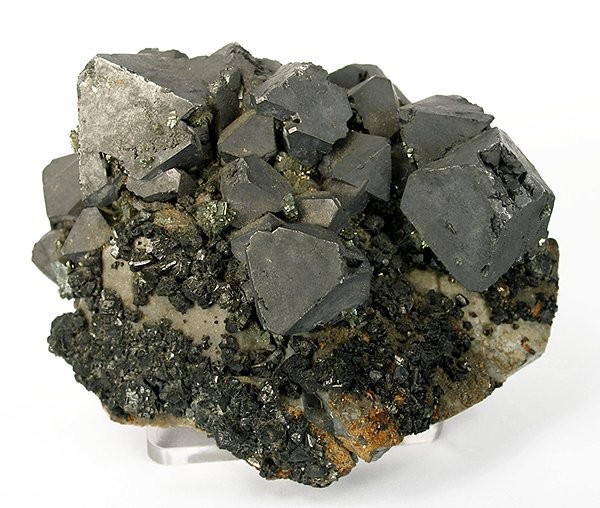 Galena, lead sulfide, the main ore of lead and often of silver: heavy, bright silver-grey cubes that break into smaller cubes.