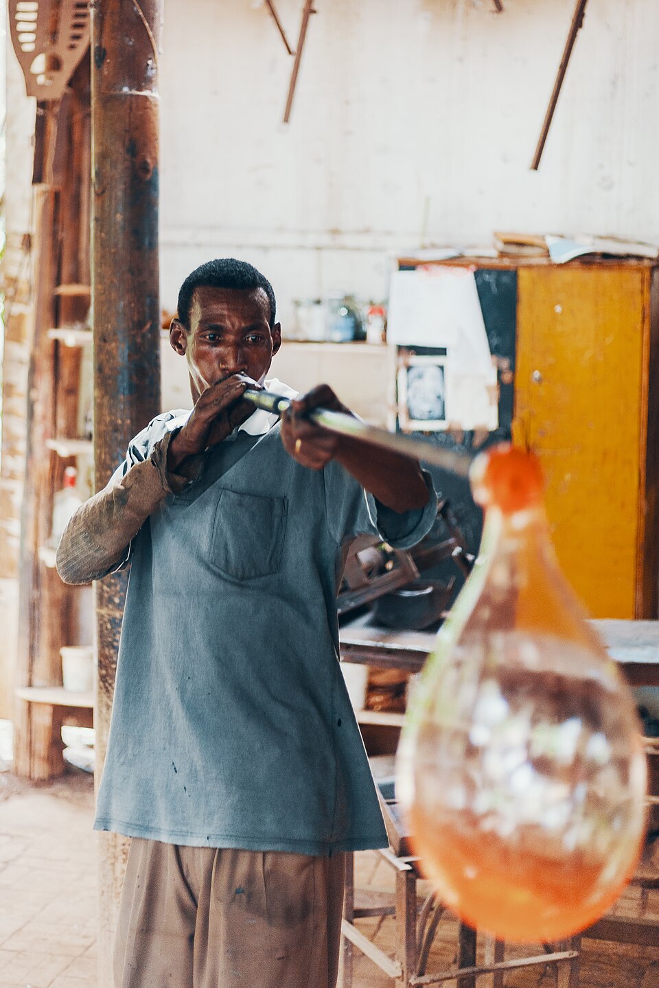 Glassblowing. Transparent, inert containers make chemistry and medicine possible.