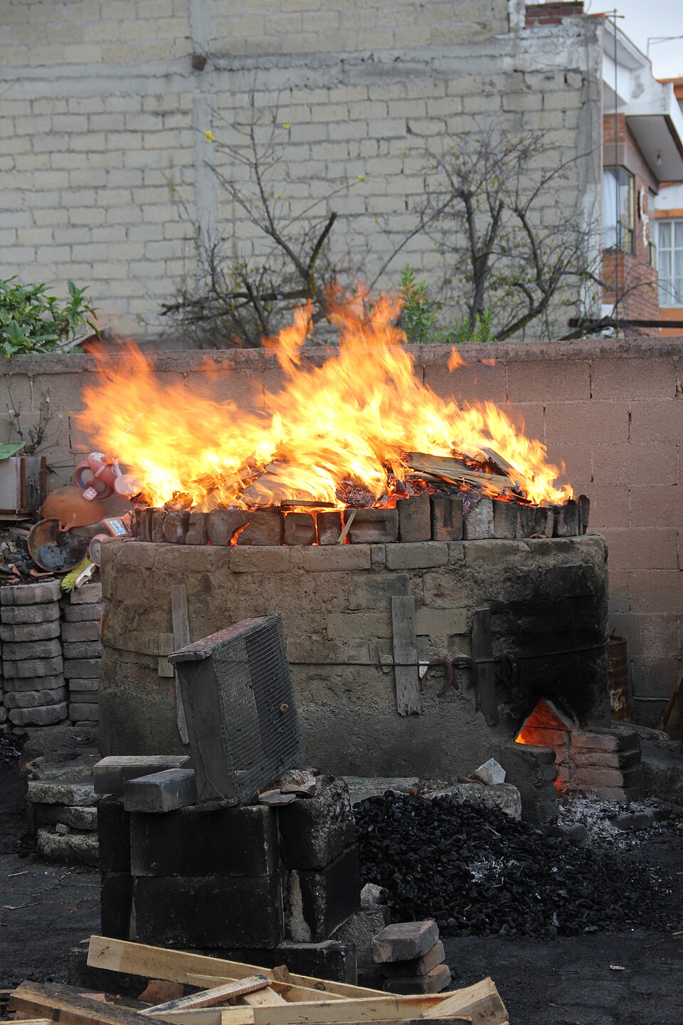 An updraught kiln at full firing. Pottery is the first step that needs real temperature control.