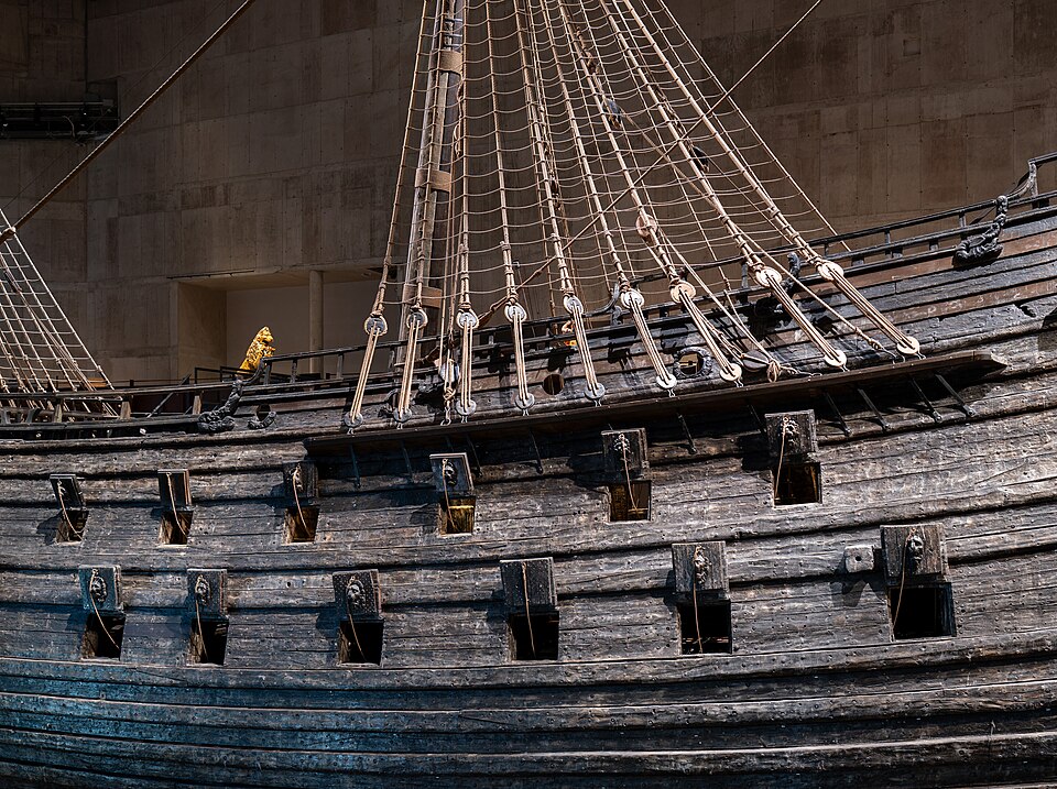The warship Vasa in its museum in Stockholm: two rows of gun ports low on a tall hull. It capsized in 1628, about 20 minutes into its first voyage.