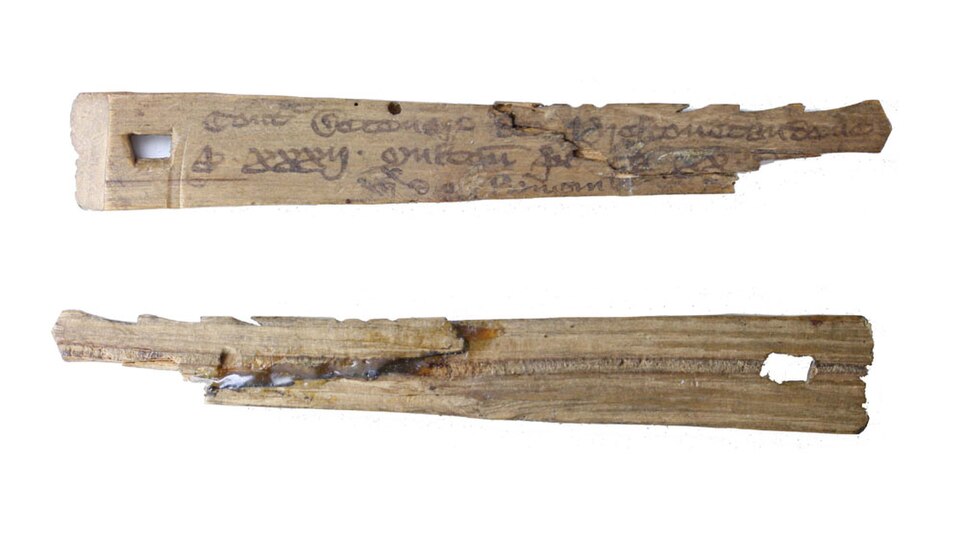 Medieval tally sticks, split so both parties hold a matching record of a debt.