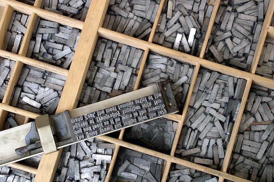 Metal movable type in the case. Copying stops being the bottleneck.