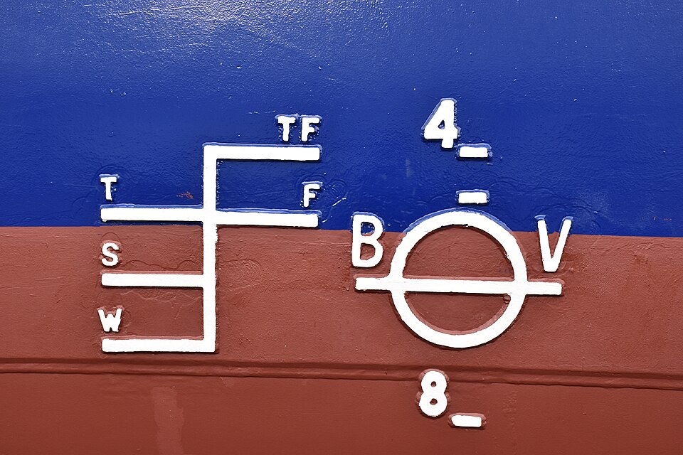 A load line mark on a ship's side, 2025: the ring and line for summer, and the lines for tropical fresh, fresh, tropical, summer and winter loading.