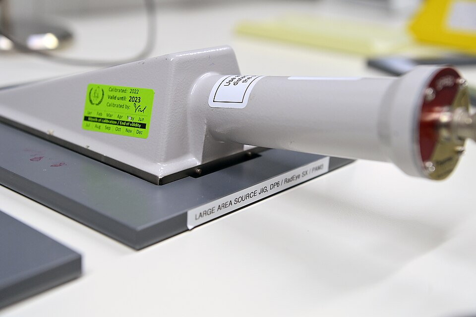 A surface contamination meter after calibration at the IAEA's laboratories in Seibersdorf, 2023, labelled with the month of calibration, the end of its validity and its calibration factors.