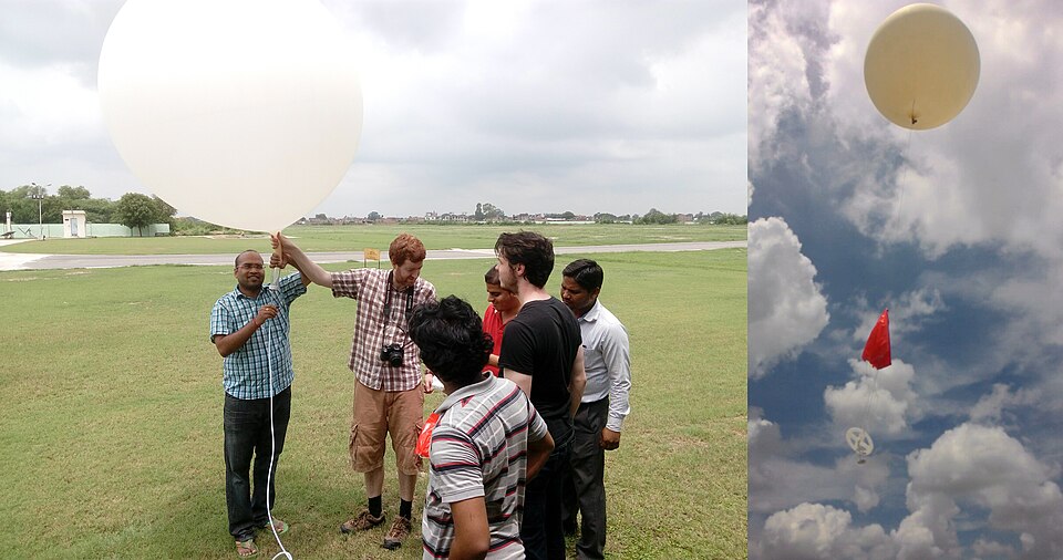 Releasing a weather balloon, 2021: the instrument hanging below radios back temperature, humidity and pressure as it climbs.