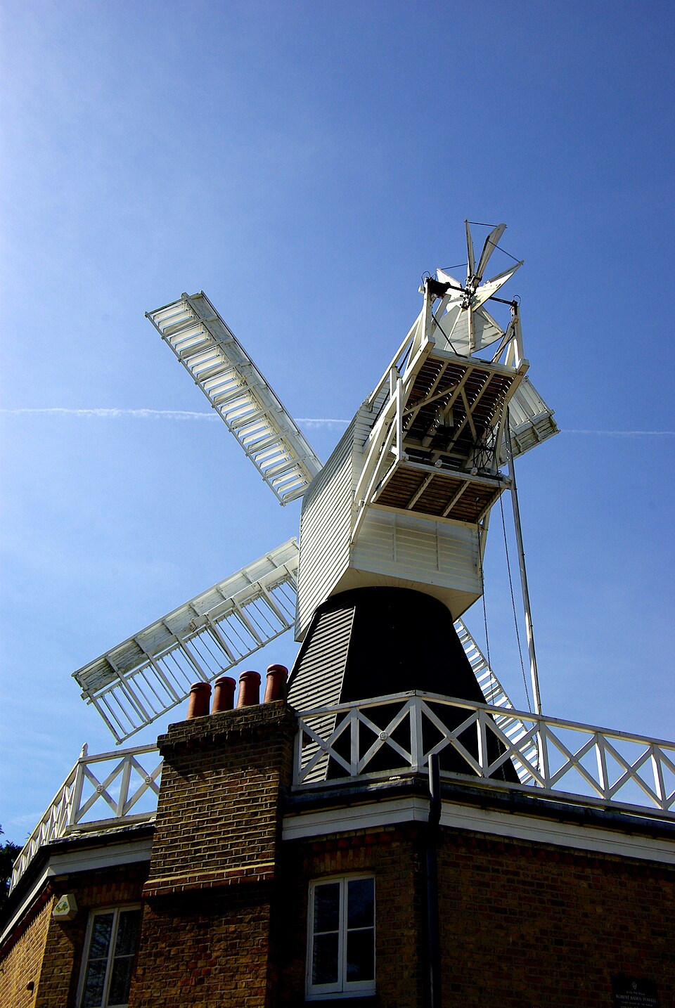 A full set of sails with their shutters closed. The sail is twisted along its length — steeper at the hub, nearly flat at the tip — because the tip travels several times faster and meets the wind almost edge-on.