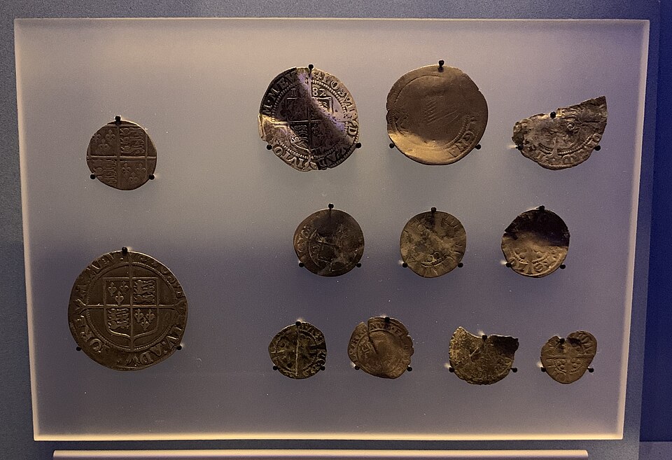Hammered silver coins with much of their rim clipped away, at the Museum on the Mound, Edinburgh.
