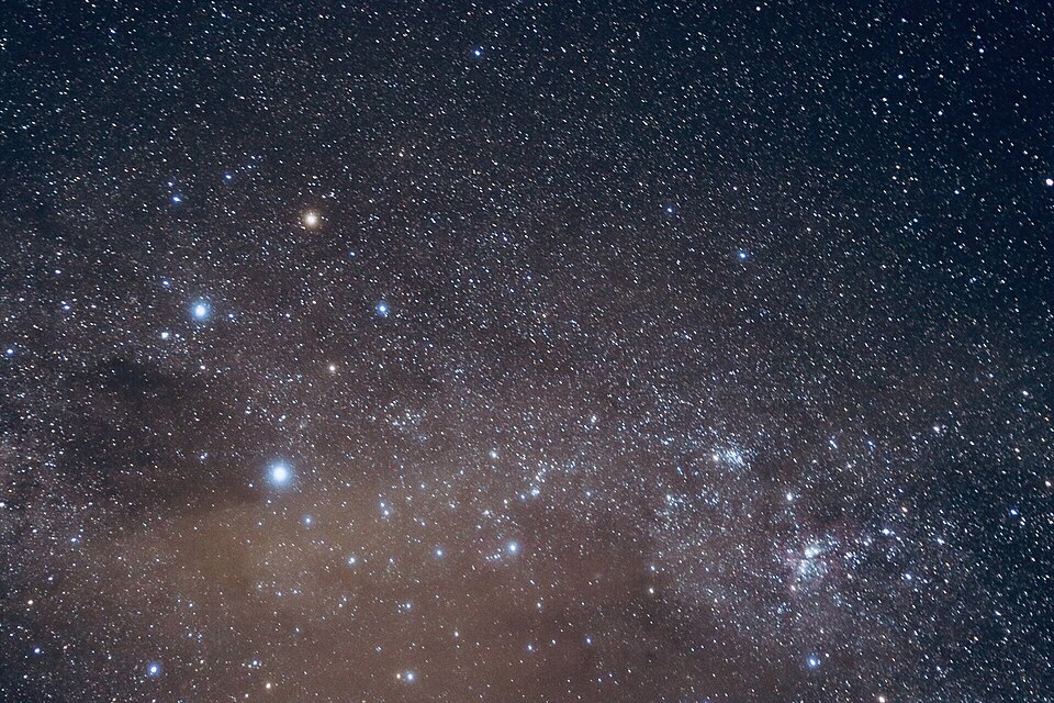 The Southern Cross with its two bright Pointers to one side and the dark Coalsack beside it. Its long axis points toward the south celestial pole.