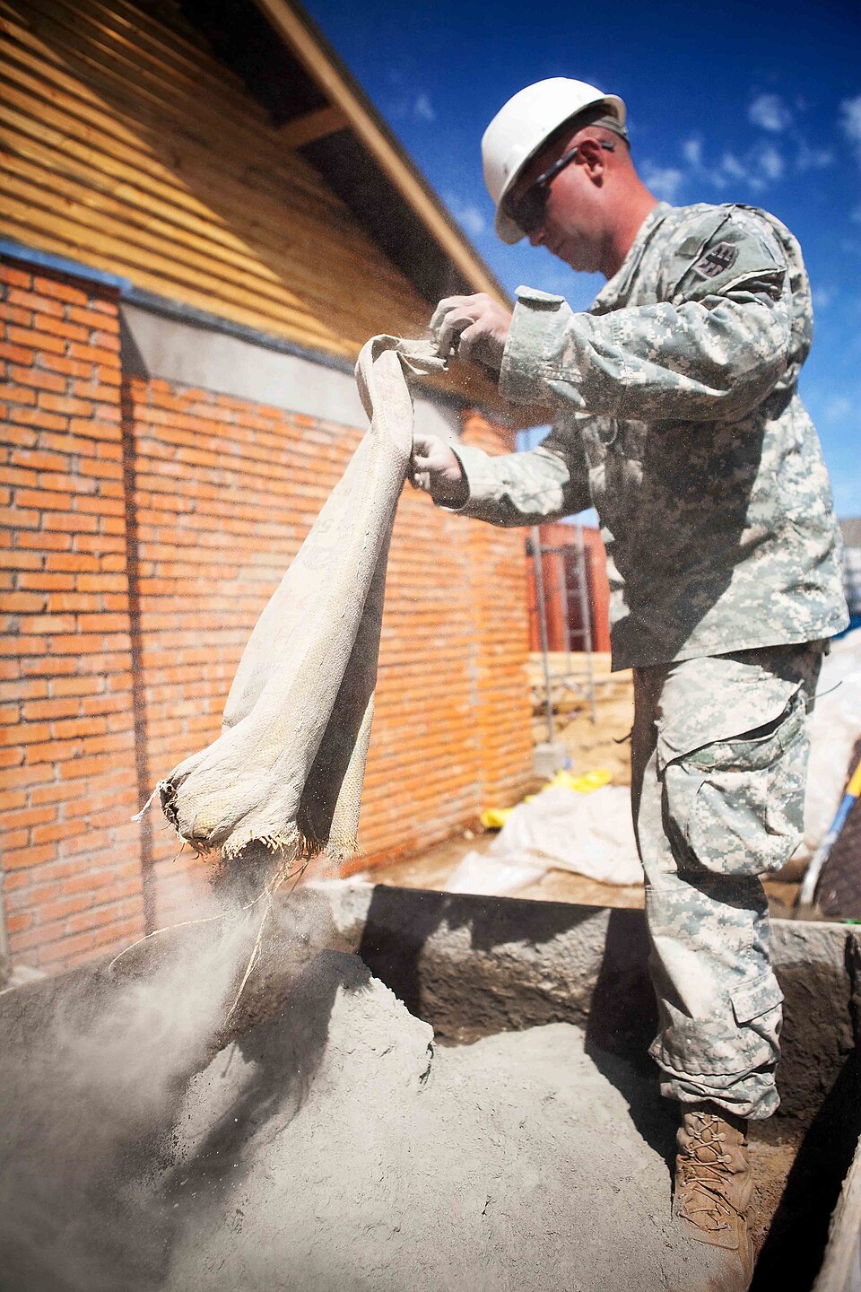 Cement being mixed on site. A binder that sets under water changes what can be built.